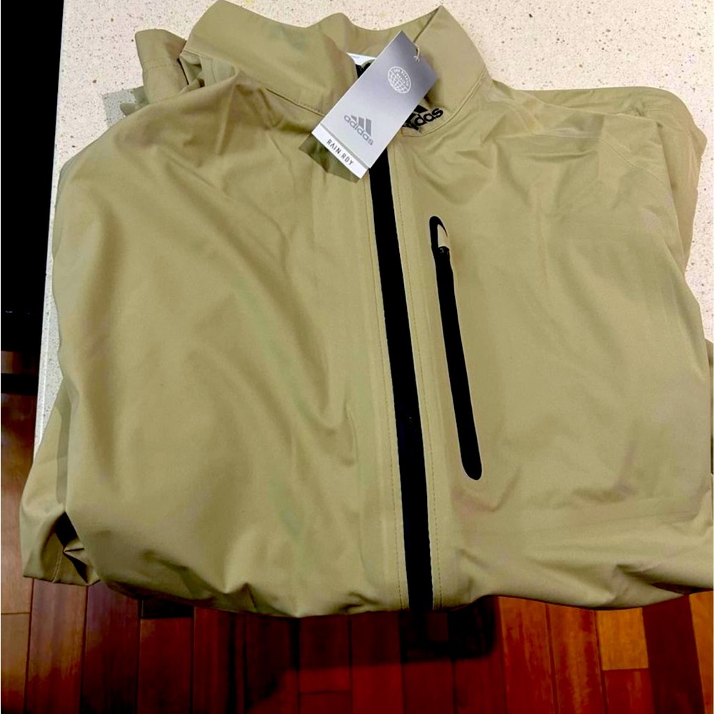 Brand new adidas golf rain jacket